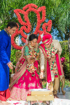 Indian couple making offerings to sacred fire. Indian couple making offerings to sacred fire.