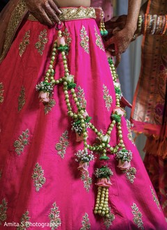 Elegant Indian bridal lehengas hanging ornaments. Elegant Indian bridal lehengas hanging ornaments.