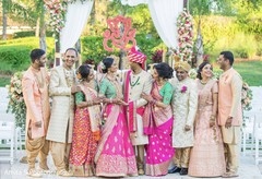 Indian lovebirds posing with relatives. Indian lovebirds posing with relatives.