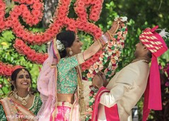 Indian bride and groom exchanging garlands ceremony. Indian bride and groom exchanging garlands ceremony.
