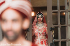 Enchanting Indian bride about to surprise her groom. Enchanting Indian bride about to surprise her groom.