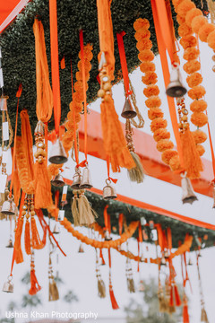 Orange Indian wedding mandap decorations. Orange Indian wedding mandap decorations.