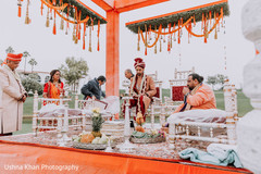 Indian groom at his welcoming to mandap ritual. Indian groom at his welcoming to mandap ritual.