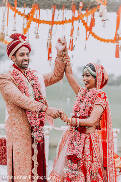Joyful Indian couple at wedding ceremony capture. Joyful Indian couple at wedding ceremony capture.
