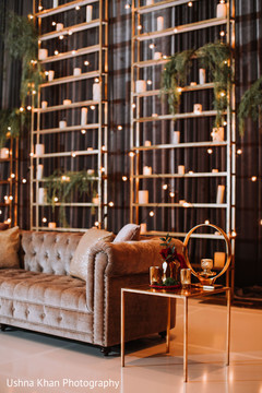 Impressive Indian wedding reception stage candles decor. Impressive Indian wedding reception stage candles decor.