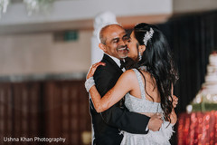 Indian bride dancing with her father capture. Indian bride dancing with her father capture.