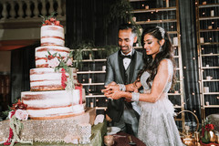 Indian wedding cutting the cake scene. Indian wedding cutting the cake scene.