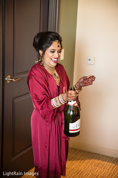 Lovely indian bride celebrating with wine Lovely indian bride celebrating with wine