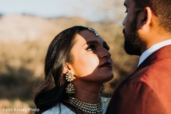 Indian bride and groom looking at each other Indian bride and groom looking at each other