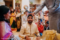 Indian groom during the pre wedding rituals Indian groom during the pre wedding rituals