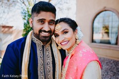 Indian bride and groom posing for pictures Indian bride and groom posing for pictures