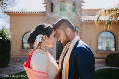 Indian bride and groom posing for pictures Indian bride and groom posing for pictures