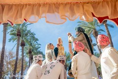 Bride and groomsmen during the rituals Bride and groomsmen during the rituals