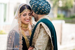 Indian bride and groom having a romantic moment Indian bride and groom having a romantic moment