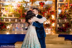 Indian bride and groom hugging Indian bride and groom hugging