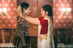 Lovely Maharani with Indian bridesmaid getting ready. Lovely Maharani with Indian bridesmaid getting ready.