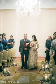 Dazzling indian bride with parent ceremony entrance. Dazzling indian bride with parent ceremony entrance.