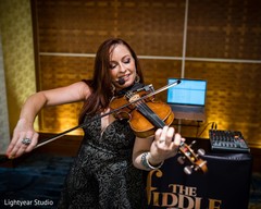 Indian wedding ceremony violinist. Indian wedding ceremony violinist.