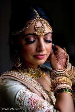 Indian bride showing her makeup Indian bride showing her makeup