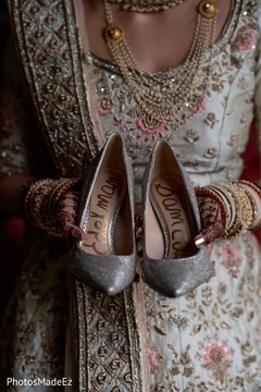 Indian bride showing her shoes Indian bride showing her shoes
