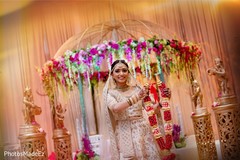 Indian bride posing by the mandap Indian bride posing by the mandap