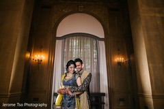 Indian bride and groom during the photoshoot Indian bride and groom during the photoshoot