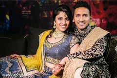 Indian bride and groom posing for pictures Indian bride and groom posing for pictures