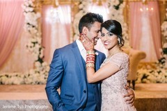 Indian bride and groom posing for pictures Indian bride and groom posing for pictures