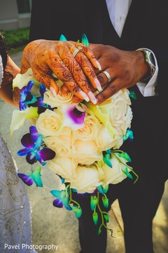 Indian lovebirds showing their wedding rings. Indian lovebirds showing their wedding rings.