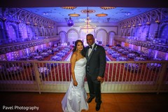 Lovely Indian couple at their reception venue. Lovely Indian couple at their reception venue.