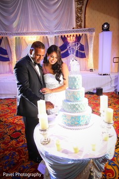 Lovely Indian couple cutting cake moment. Lovely Indian couple cutting cake moment.