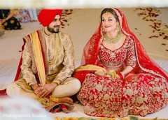 Indian newlyweds excited in their ceremony Indian newlyweds excited in their ceremony