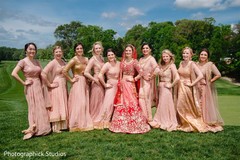 Elegant Indian bride and bridesmaids posing for photo shoot Elegant Indian bride and bridesmaids posing for photo shoot
