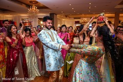 Joyful Indian bride and groom at their sangeet celebration. Joyful Indian bride and groom at their sangeet celebration.