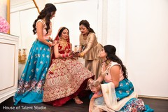 Maharani getting her ceremony shoes on. Maharani getting her ceremony shoes on.