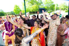 Indian groom's milni celebration. Indian groom's milni celebration.