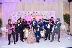 Indian bride, groom and groomsmen at reception capture. Indian bride, groom and groomsmen at reception capture.