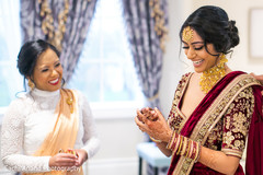 Lovely Indian bride getting her bangles on. Lovely Indian bride getting her bangles on.