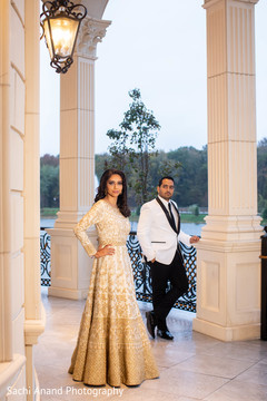 Elegant Indian couple posing for photo shoot. Elegant Indian couple posing for photo shoot.