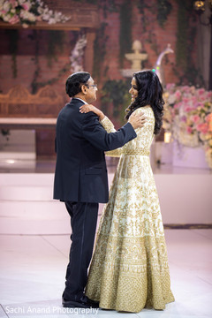 Indian bride dancing with her father capture Indian bride dancing with her father capture