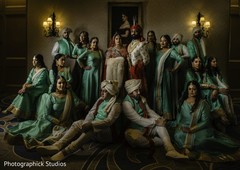 Elegant Indian couple posing with bridesmaids and groomsmen. Elegant Indian couple posing with bridesmaids and groomsmen.