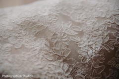 Close up capture of maharani's white wedding dress embroidery. Close up capture of maharani's white wedding dress embroidery.