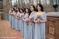 Lovely Indian bridesmaids posing with their bouquets. Lovely Indian bridesmaids posing with their bouquets.