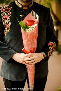 Closeup capture of Indian groom's rose for bride. Closeup capture of Indian groom's rose for bride.