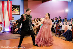 Lovely capture of Indian bride and groom at their engagement dance. Lovely capture of Indian bride and groom at their engagement dance.