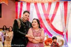 Gleeful indian wedding engagement dance. Gleeful indian wedding engagement dance.