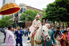 Elegant Indian groom riding baraat white horse Elegant Indian groom riding baraat white horse