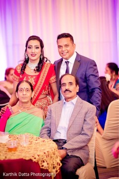 Indian couple posing with relatives. Indian couple posing with relatives.