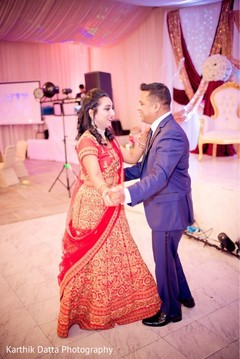 Indian lovebirds having their first dance. Indian lovebirds having their first dance.