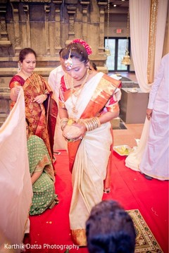 Maharani entering the mandap with coconut. Maharani entering the mandap with coconut.